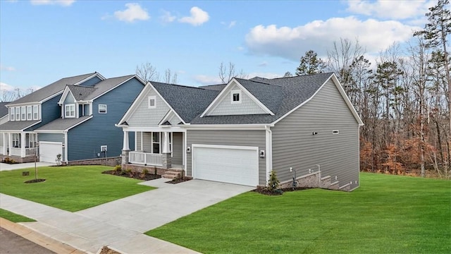 craftsman-style home featuring a garage, covered porch, and a front lawn