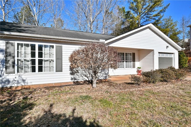 exterior space with a garage