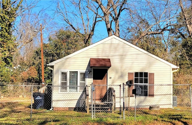 bungalow with a front yard