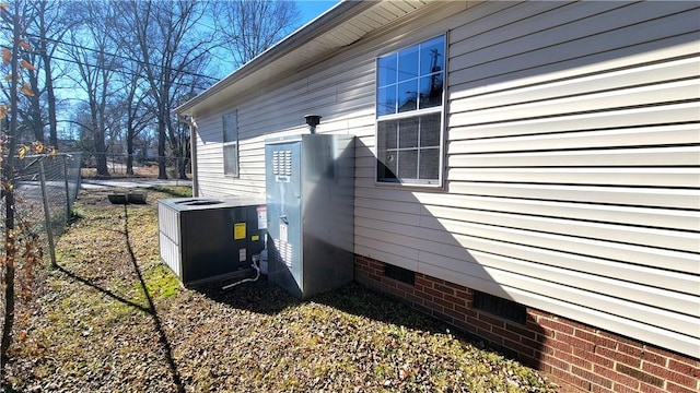 view of home's exterior with cooling unit