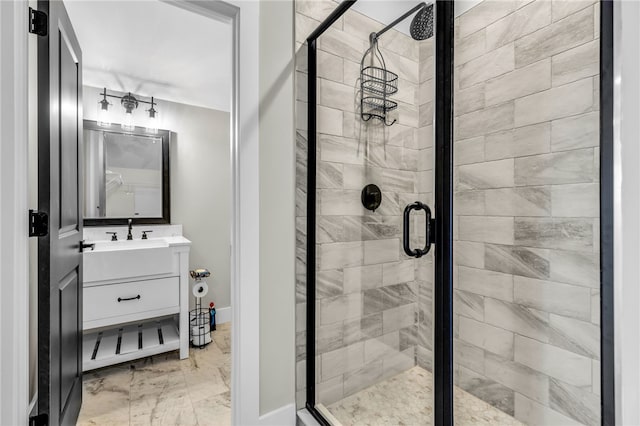 bathroom with vanity and an enclosed shower