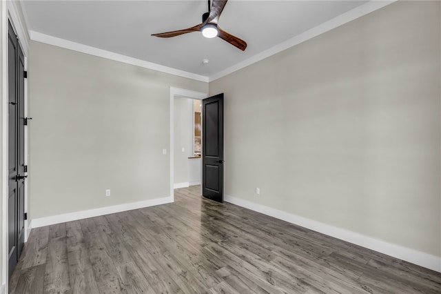 unfurnished room featuring crown molding, ceiling fan, and light wood-type flooring