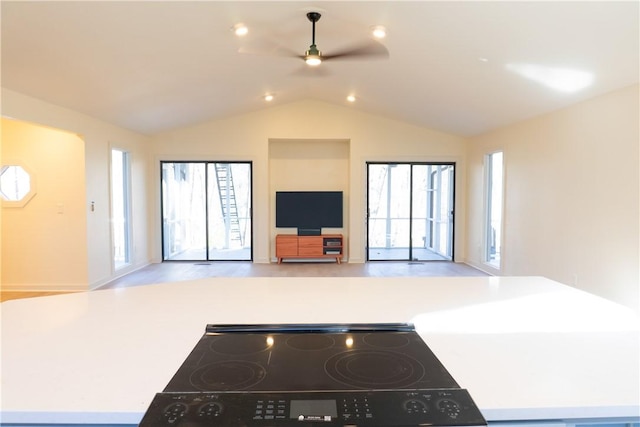 24 Mainsail Dr, Salem, SC 29676 - kitchen with open floor plan, vaulted ceiling, a ceiling fan, and stove