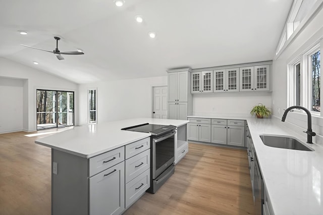 24 Mainsail Dr, Salem, SC 29676 - kitchen with a ceiling fan, stainless steel range with electric stovetop, light countertops, a sink, and gray cabinetry