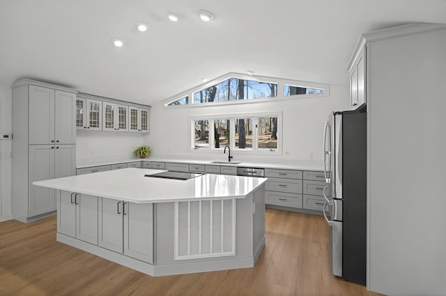 24 Mainsail Dr, Salem, SC 29676 - kitchen featuring a sink, gray cabinetry, vaulted ceiling, stainless steel appliances, and a kitchen island