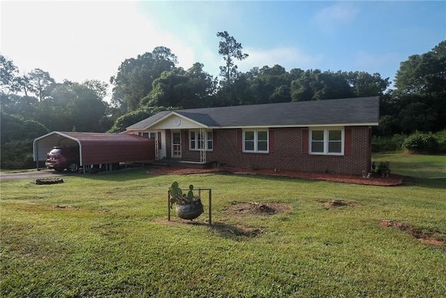 ranch-style house featuring a front yard and a carport