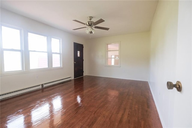 unfurnished room with a baseboard heating unit, dark hardwood / wood-style floors, and ceiling fan