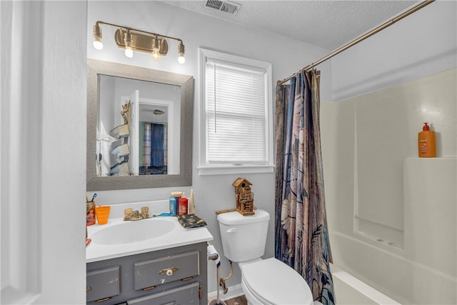 full bathroom featuring vanity, toilet, shower / bath combo, and a wealth of natural light