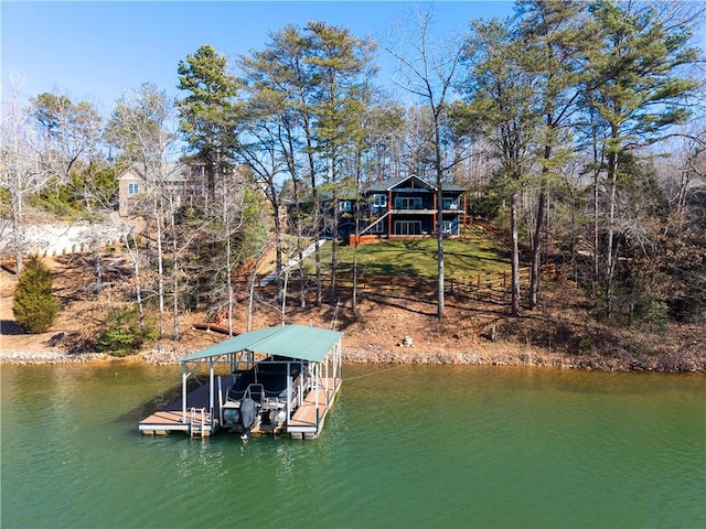 view of dock featuring a water view and boat lift