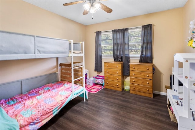 bedroom featuring dark wood-type flooring and ceiling fan