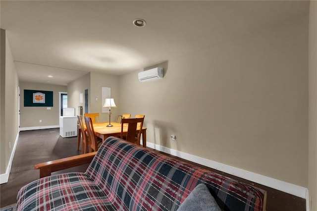 dining room featuring a wall unit AC