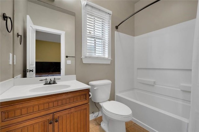 full bathroom featuring tile patterned flooring, vanity, bathtub / shower combination, and toilet