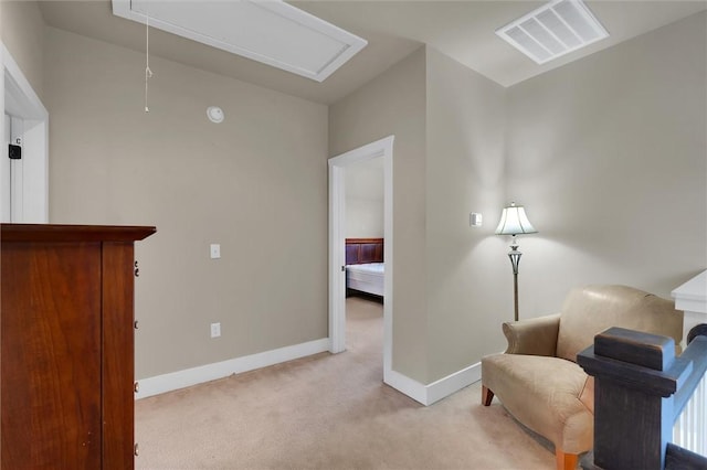 sitting room with light carpet