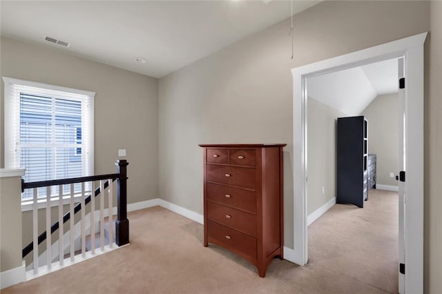 hallway with light carpet