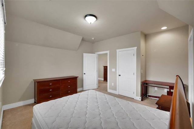 bedroom with light colored carpet