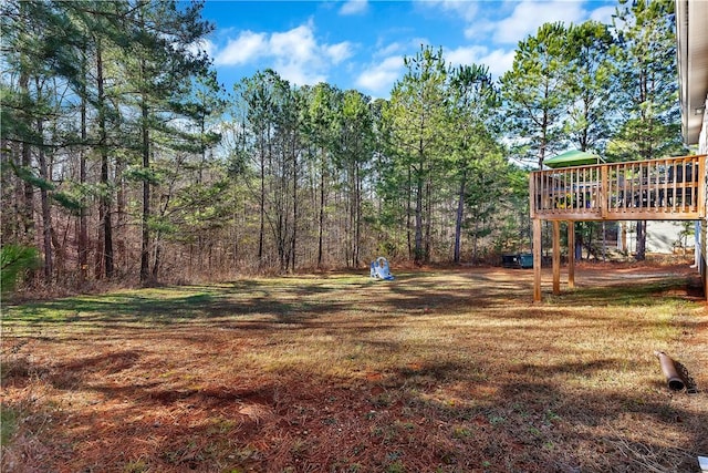 view of yard featuring a deck