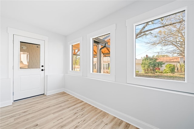 foyer entrance featuring light hardwood / wood-style flooring