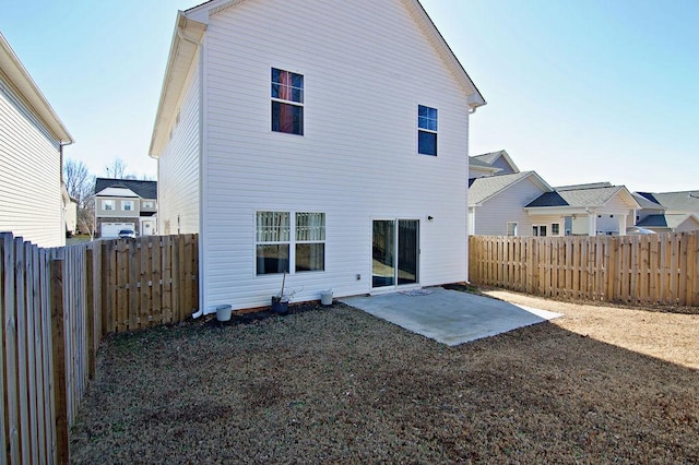 back of property featuring a patio