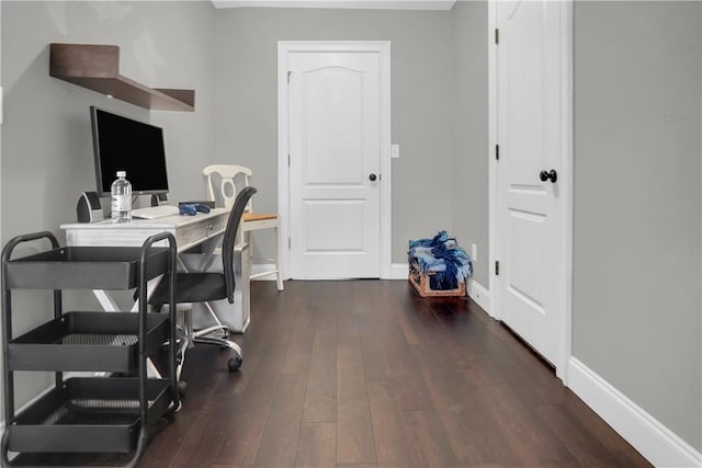 office space with dark hardwood / wood-style flooring