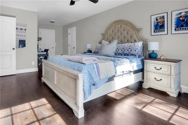 bedroom featuring dark hardwood / wood-style floors and ceiling fan