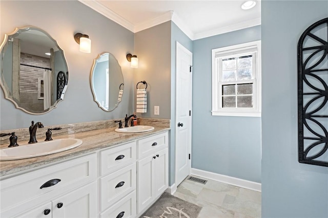 bathroom with vanity and crown molding