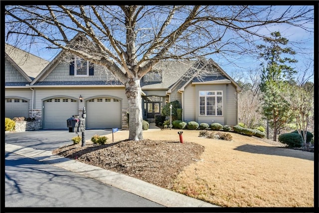 craftsman inspired home featuring a garage