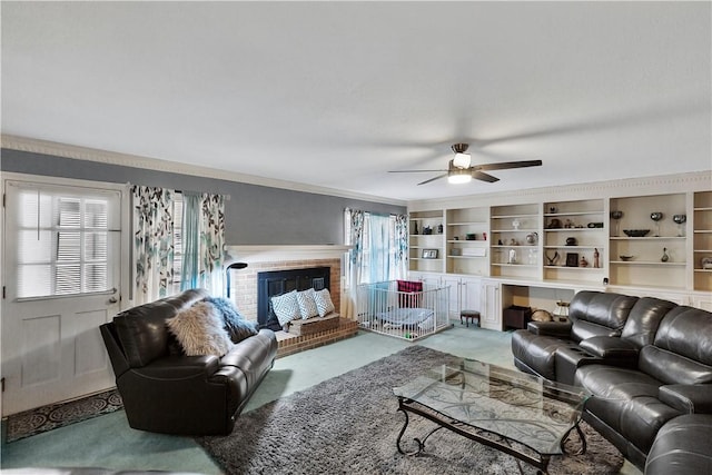 living room with ceiling fan, carpet, and a fireplace