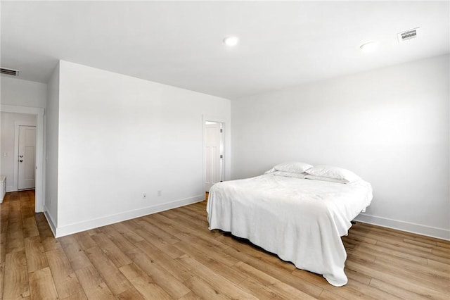 bedroom featuring light wood-type flooring