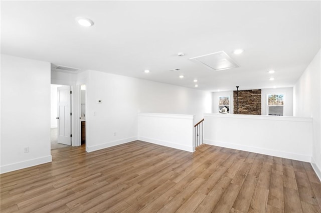 unfurnished room with light hardwood / wood-style floors