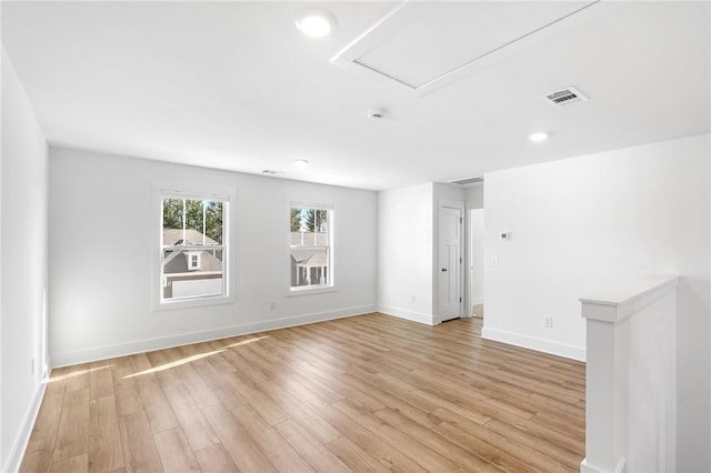 empty room featuring light hardwood / wood-style floors