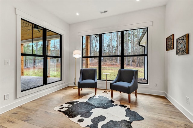 sitting room with light wood-type flooring