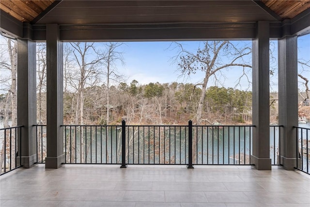 view of patio featuring a balcony