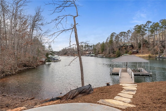 dock area featuring a water view