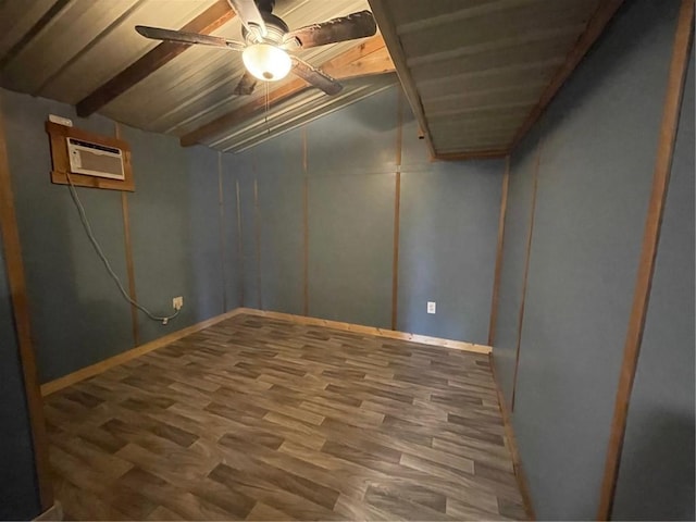 basement with an AC wall unit, hardwood / wood-style floors, and ceiling fan