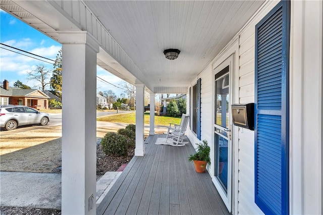 deck featuring covered porch