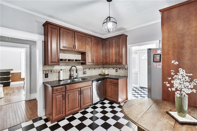 kitchen featuring tasteful backsplash, ornamental molding, stainless steel appliances, and sink