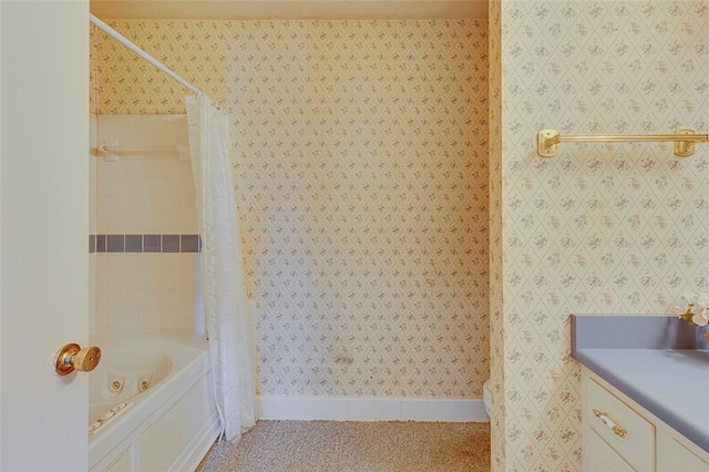 bathroom featuring vanity and shower / bath combo with shower curtain