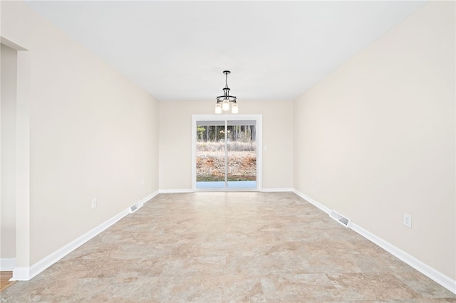 unfurnished dining area with a notable chandelier