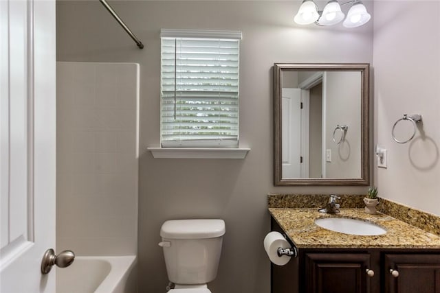 full bathroom with shower / bathtub combination, vanity, and toilet