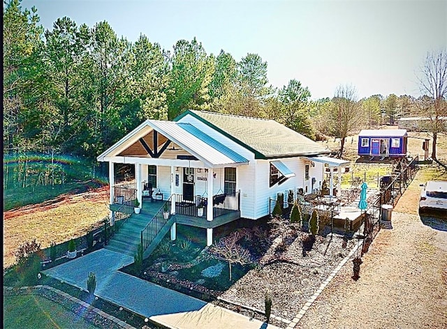 view of front of home featuring covered porch