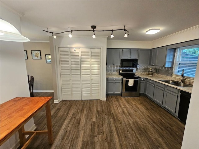 kitchen featuring sink, crown molding, backsplash, black appliances, and dark hardwood / wood-style flooring