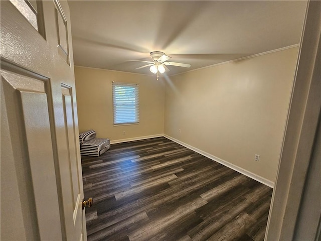 unfurnished room with ceiling fan, ornamental molding, and dark hardwood / wood-style flooring