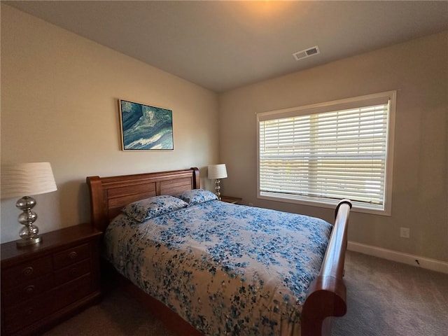 carpeted bedroom featuring vaulted ceiling