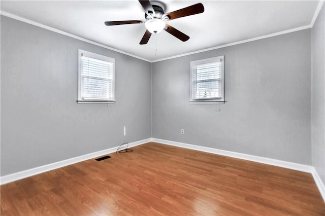 unfurnished room featuring ornamental molding, hardwood / wood-style floors, and ceiling fan