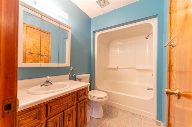 full bathroom with vanity, bathtub / shower combination, and toilet