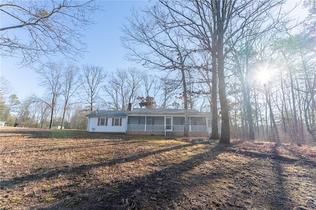 ranch-style home featuring covered porch