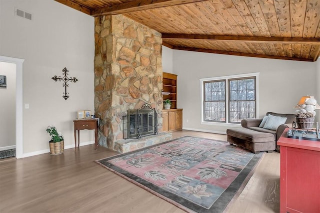 living room with high vaulted ceiling, a fireplace, dark wood-type flooring, wooden ceiling, and beam ceiling