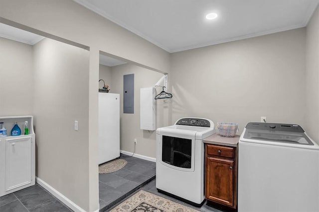 laundry room with crown molding, independent washer and dryer, and electric panel