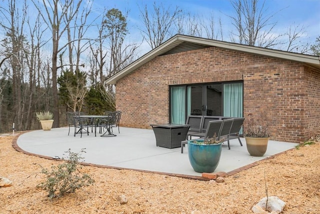 back of house featuring a patio area