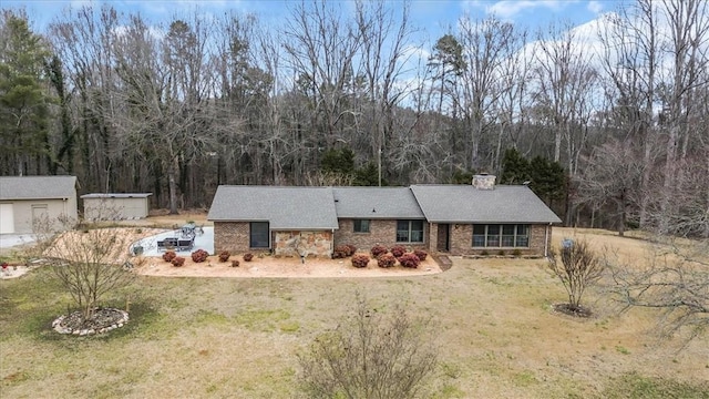 view of front of home with a front yard